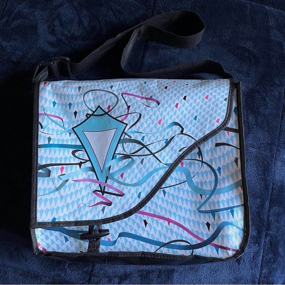 Ivivva Reusable Messenger/Book Plastic Crossbody Bag